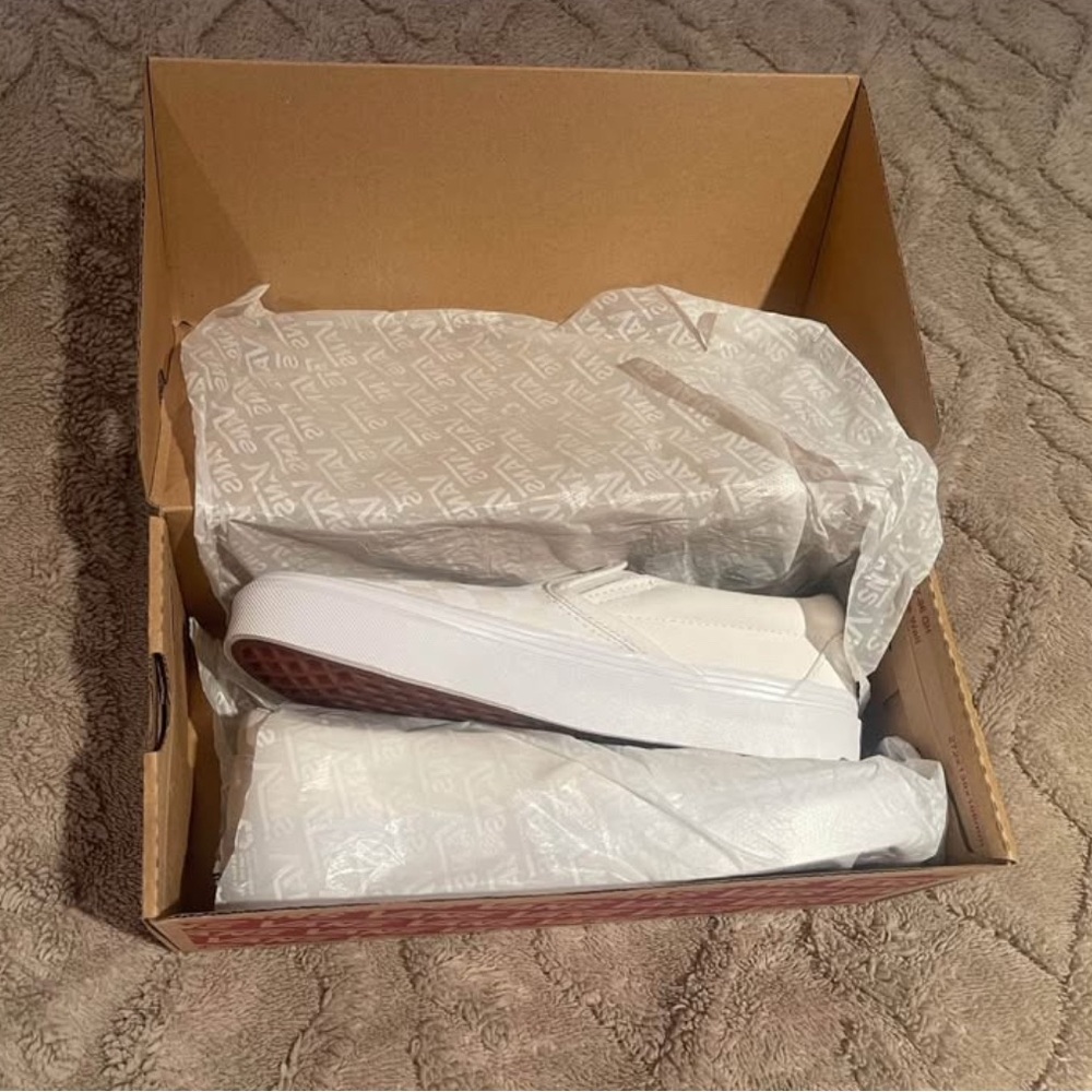 Vans Classic White Canvas Slip-Ons